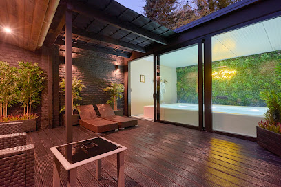 Photo Les Cottages du Parc - Hôtel & Spa privatif